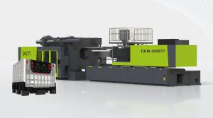 Ligne d’injection pour caisse de transport à socle de palette